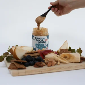 Unt de arahide cu cocos grace on a plate